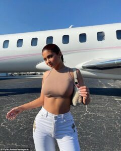 Kylie Jenner is fab in fresh makeup and trendy outfit as she boards $72m jet to get out of town for Christmas