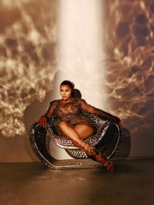 Rapper Lil Kim, 46, stuns in new collection for PrettyLittleThing